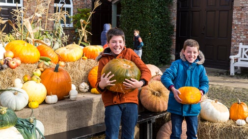Children enjoy the pumpkin, squash and gourd display at Beningbrough Hall, Gallery and Gardens, North Yorkshire